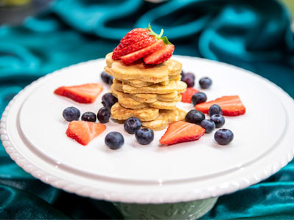 Carrot pancakes stake on a plate